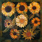 Quiltet sengeteppe – solsikkens ravglede