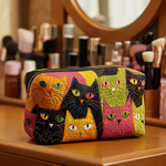 Quiltet toalettveske – katt i hagen